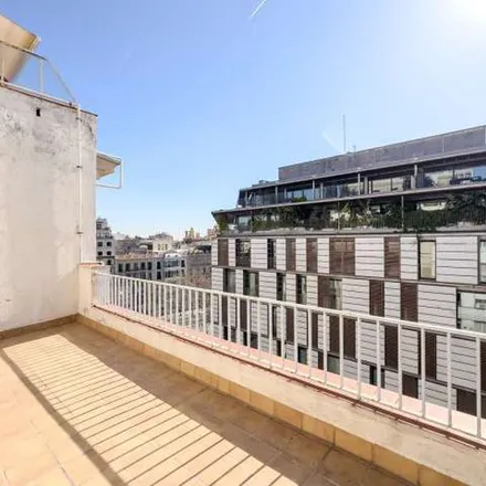 Rent this 7 bed apartment on idk pizza in Carrer del Rosselló, 08001 Barcelona