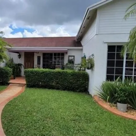 Buy this 3 bed house on 5950 Northwest 192nd Street in Hialeah, FL 33015