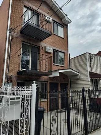Buy this 8 bed house on 471 Rutland Road in New York, NY 11203