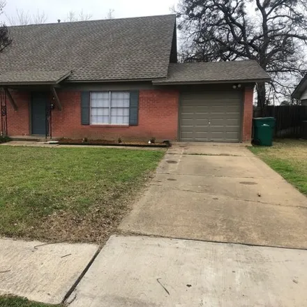 Rent this 4 bed house on 1135 Pebblebrook Drive in Lewisville, TX 75067