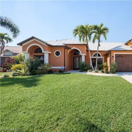Buy this 4 bed house on 5004 Southwest 27th Place in Cape Coral, FL 33914