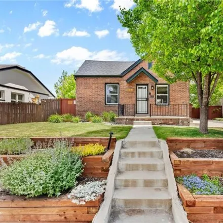 Buy this 4 bed house on East Colfax Avenue in Denver, CO 80220