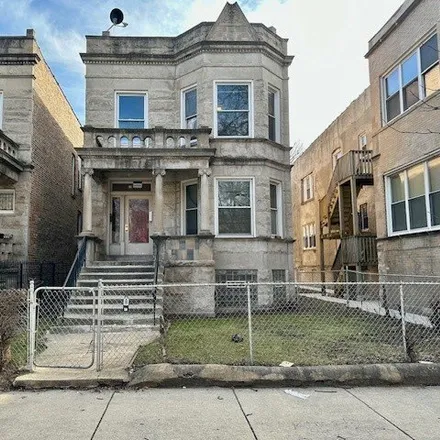 Rent this 4 bed house on 919 West Garfield Boulevard in Chicago, IL 60621