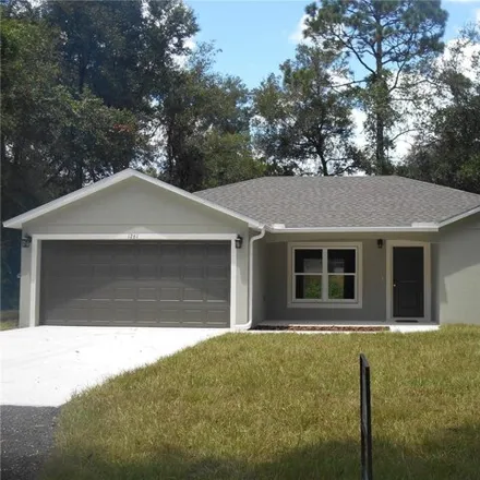 Rent this 3 bed house on 1261 3rd St in Orange City, Florida