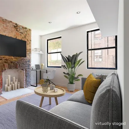 Buy this studio townhouse on 113 WEST 15TH STREET in Chelsea