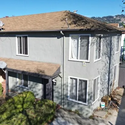 Buy this 4 bed house on 1291;1293;1295;1297 University Avenue in Berkeley, CA 94702