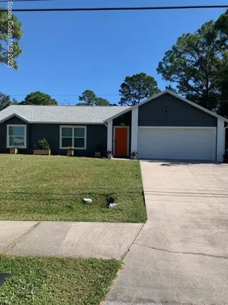 Rent this 3 bed house on Huggins Way in Palm Bay, FL 32907