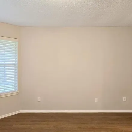 Rent this 4 bed apartment on 9294 Kirkleigh Street in Harris County, TX 77379