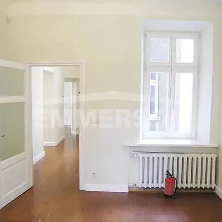 Rent this 2 bed apartment on Wspólna 29/33 in 00-519 Warsaw, Poland