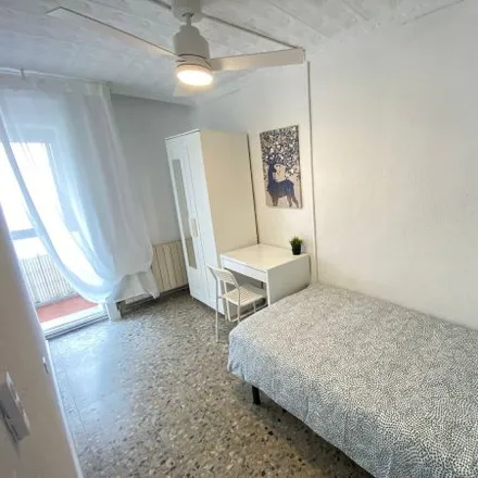 Rent this 3 bed room on Calle de Tordegrillos in 28021 Madrid, Spain