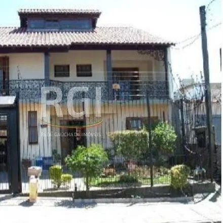 Buy this 3 bed house on Rua Henrique Arlindo Casali in Vila Nova, Porto Alegre - RS