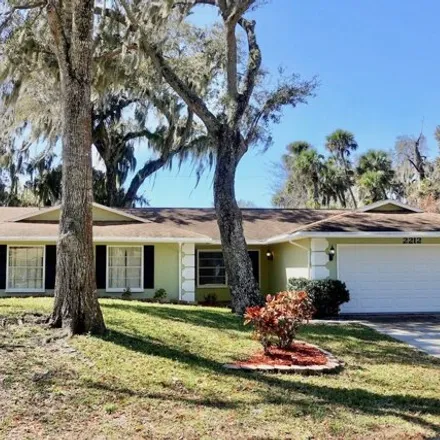 Buy this 3 bed house on 2212 Kumquat Drive in Edgewater, FL 32141