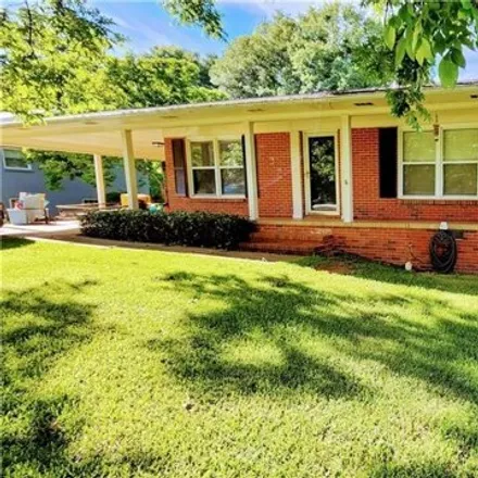 Buy this 4 bed house on 202 Etowah Ave in Opelika, Alabama