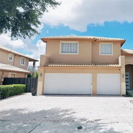 Buy this 5 bed house on 11382 Northwest 65th Street in Doral, FL 33178