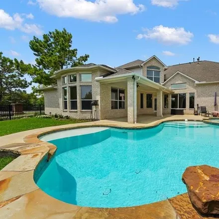 Buy this 5 bed house on 12302 Bluff Haven Ln in Cypress, Texas