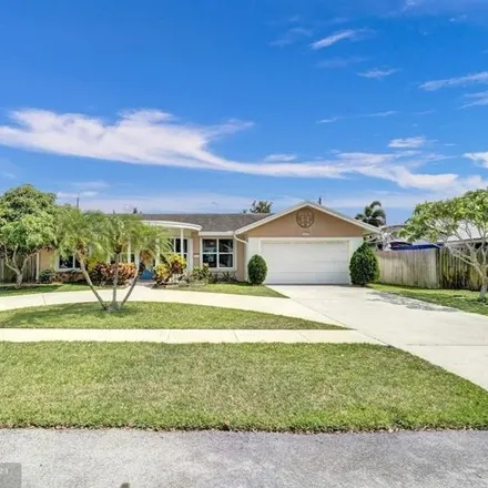 Buy this 3 bed house on 4424 Northwest 3rd Street in Coconut Creek, FL 33066