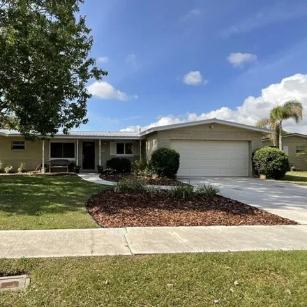Buy this 4 bed house on 829 Buttonwood Drive in Merritt Island, FL 32953