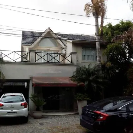 Buy this 3 bed house on Calle 14 in Partido de La Plata, 1896 City Bell