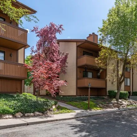 Buy this 2 bed condo on The Orchard Of Countrywoods Condominiums in 1122 Countrywoods Circle, Cottonwood Heights