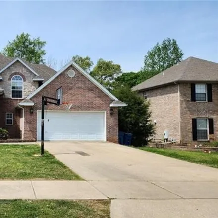Buy this 4 bed house on 407 Northwest Palamino Street in Bentonville, AR 72712