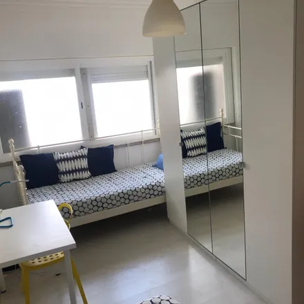Rent this 3 bed room on Rua General Leman in 1600-993 Lisbon, Portugal