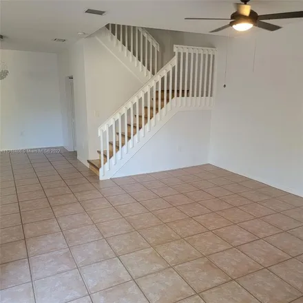 Rent this 3 bed apartment on 1100 Canella Lane in Hollywood, FL 33019