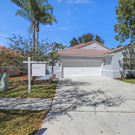 Rent this 4 bed house on Coral Cove Elementary School in Southwest 49th Court, Miramar