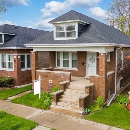 Buy this 3 bed house on 7724 South Doctor Martin Luther King Junior Drive in Chicago, IL 60619