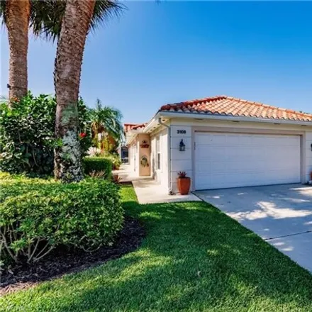 Buy this 2 bed house on Village Walk Circle in Collier County, FL 34109