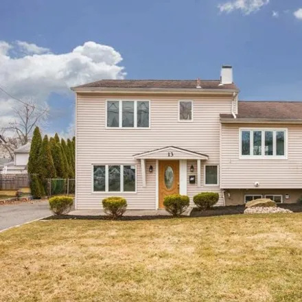 Buy this 4 bed house on 13 Califon Dr in Colonia, New Jersey