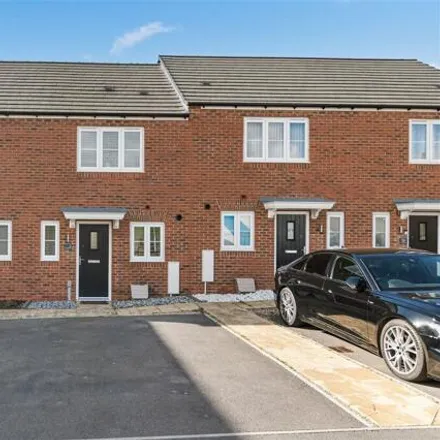 Buy this 2 bed townhouse on Juglans Grove in Wellingborough, NN8 1FY
