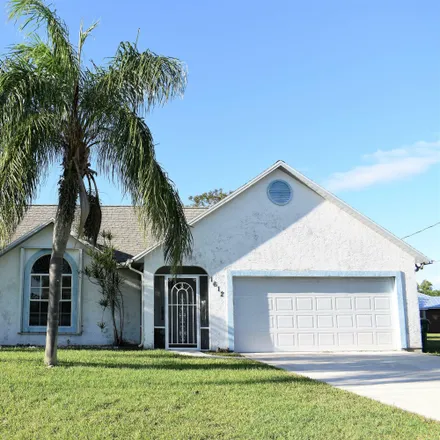 Buy this 3 bed house on 1612 Southeast Berkshire Boulevard in Port Saint Lucie, FL 34952