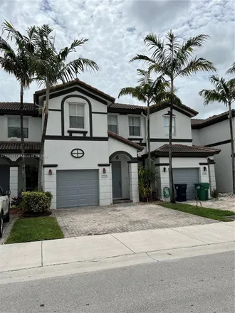 Rent this 4 bed townhouse on 7731 Northwest 114th Place in Medley, Doral