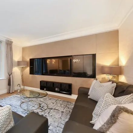 Rent this 3 bed apartment on Hyde Park Residence in 55 Park Lane, London