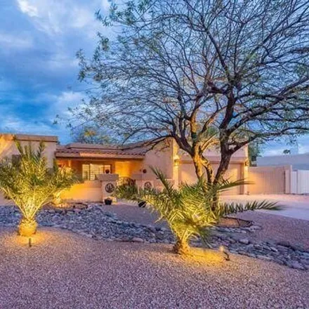 Buy this 4 bed house on 14633 North 55th Place in Scottsdale, AZ 85254
