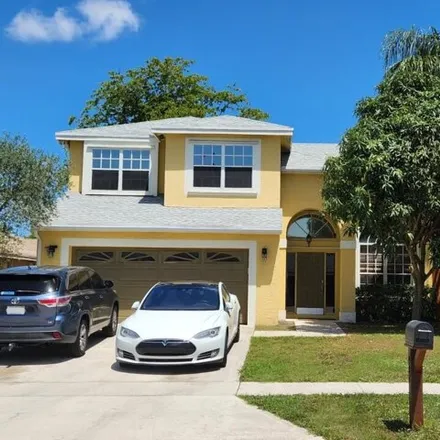Buy this 4 bed house on 9021 Paragon Way in Rainbow Lakes, Palm Beach County