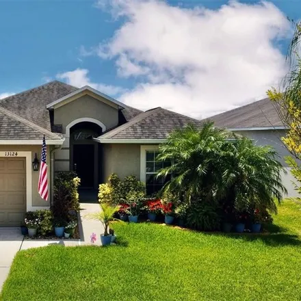 Buy this 4 bed house on 13124 Royal Pines Avenue in Riverview, FL 33579