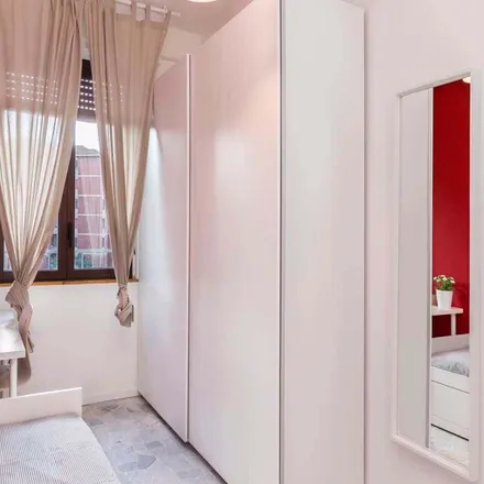 Rent this 3 bed room on Largo Cavalieri di Malta in 6, 20146 Milan MI