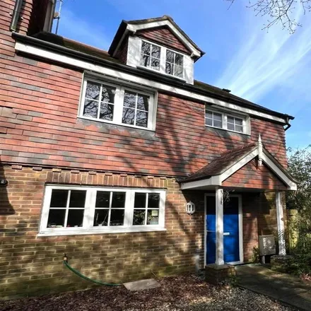 Rent this 4 bed townhouse on Pondtail Park in Horsham, RH12 5LD