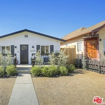 Rent this 2 bed house on 1269 1/2 S Muirfield Rd in Los Angeles, California