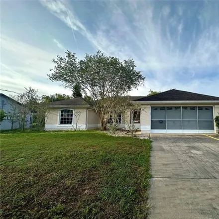 Rent this 3 bed house on 1931 N Portillo Dr in Deltona, Florida