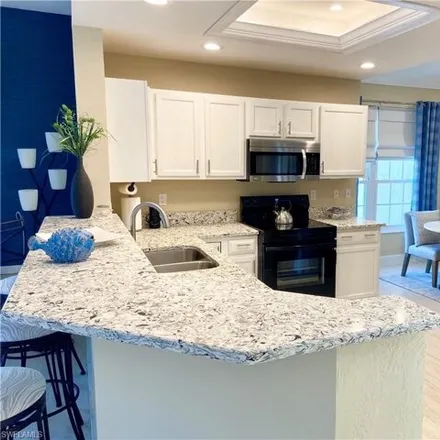 Rent this 2 bed condo on 739 Wiggins Lake Drive in Gulf Harbor, Collier County