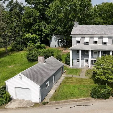 Buy this 4 bed house on 115 Walnut Avenue in Scottdale, Westmoreland County