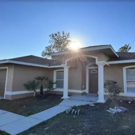 Buy this 4 bed house on 4868 Southwest 148th Place in Marion County, FL 34473