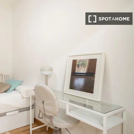 Rent this 5 bed room on Luis Cernuda in Calle de Viriato, 28010 Madrid