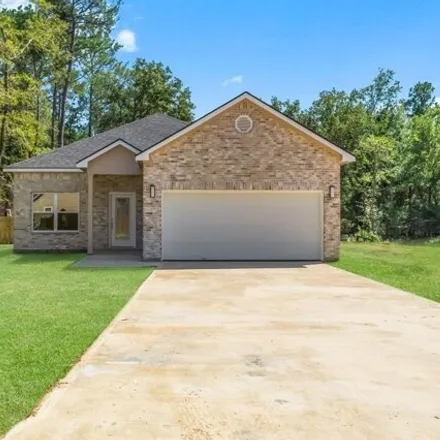 Buy this 3 bed house on 405 East Cattle Drive in Polk County, TX 77360