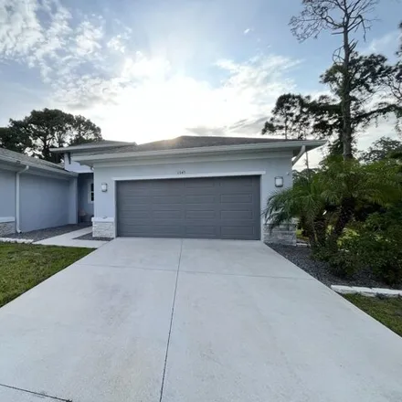 Buy this 3 bed house on 1351 Amelia Avenue Southwest in Palm Bay, FL 32908