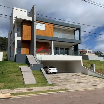 Buy this 4 bed house on unnamed road in Vila Nova, Porto Alegre - RS