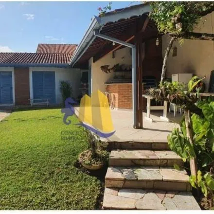 Rent this 4 bed house on Avenida Itapuã in Morada da Praia, Bertioga - SP