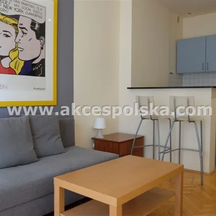 Rent this 1 bed apartment on Marshal Street in 00-005 Warsaw, Poland
